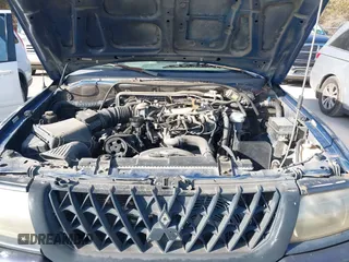 2002 Mitsubishi Montero Sport ES with VIN JA4LS21H02J040318, listed as a IAAI auction lot 41272566 with 278,339 mi miles. Bid and sale history available at carsss.com. Image 10.