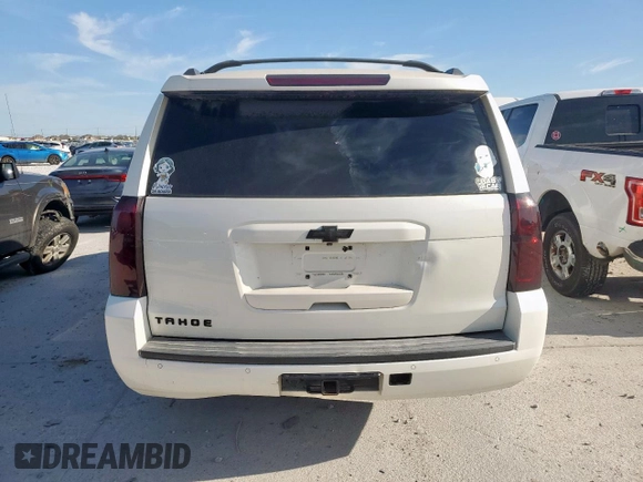 2015 Chevrolet Tahoe LT z VIN 1GNSCBKC0FR159342, wystawiony jako Copart lot #58051145 z przebiegiem 156 440 mil mil oraz Czysty tytuł • Clean title. Historia ofert i sprzedaży dostępna na DreamBid. Obrazek 6.