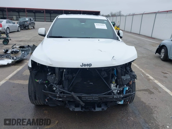 2021 Jeep Grand Cherokee Laredo E with VIN 1C4RJEAG7MC713026, listed as a IAAI auction lot 42010894 with 37,336 mi miles and . Bid and sale history available at DreamBid. Image 13.