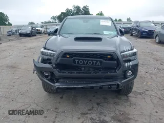 2022 Toyota Tacoma SR with VIN 3TMCZ5AN2NM507478, listed as a IAAI auction lot 42425907 with 40,796 mi miles and . Bid and sale history available at DreamBid. Image 6.