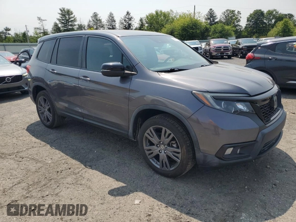 2019 Honda Passport EX-L with VIN 5FNYF8H51KB005843, listed as a Copart auction lot 59501565 with 47,051 mi miles and Salvage title. Bid and sale history available at DreamBid. Image 4.