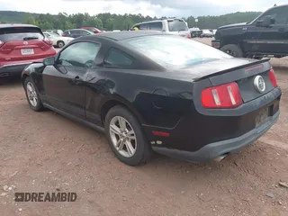 2012 Ford Mustang Premium with VIN 1ZVBP8AM6C5233888, listed as a IAAI auction lot 42714667 with 153,219 mi miles and . Bid and sale history available at DreamBid. Image 3.