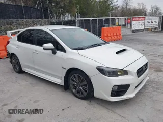 2015 Subaru WRX with VIN JF1VA1A67F9819707, listed as a IAAI auction lot 42021831 with 104,706 mi miles. Bid and sale history available at carsss.com. Image 1.