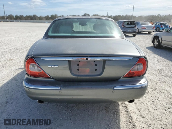 2004 Jaguar XJ 8 with VIN SAJWA71C84SG17802, listed as a Copart auction lot 76880914 with Not Provided miles and Non Repairable. Bid and sale history available at DreamBid. Image 6.
