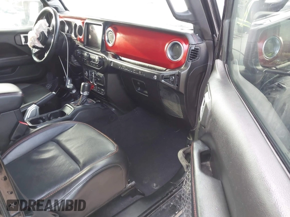 2020 Jeep Wrangler Unlimited Rubicon with VIN 1C4HJXFG1LW141335, listed as a IAAI auction lot 42724973 with 59,843 mi miles and . Bid and sale history available at DreamBid. Image 5.
