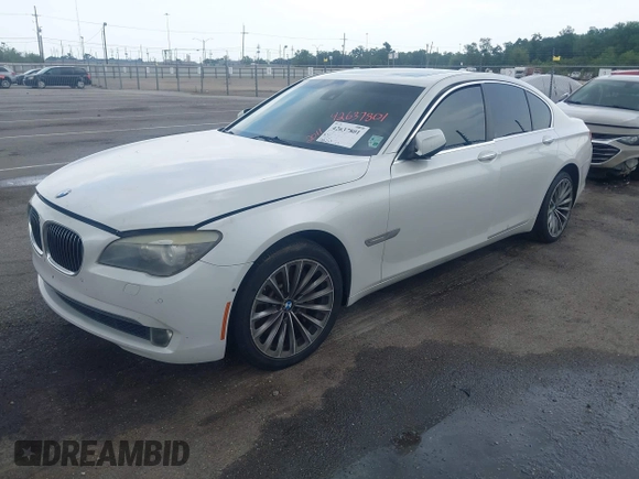 2011 BMW 7 Series 750i with VIN WBAKA8C56BCY37281, listed as a IAAI auction lot 42637801 with 122,263 mi miles and . Bid and sale history available at DreamBid. Image 2.