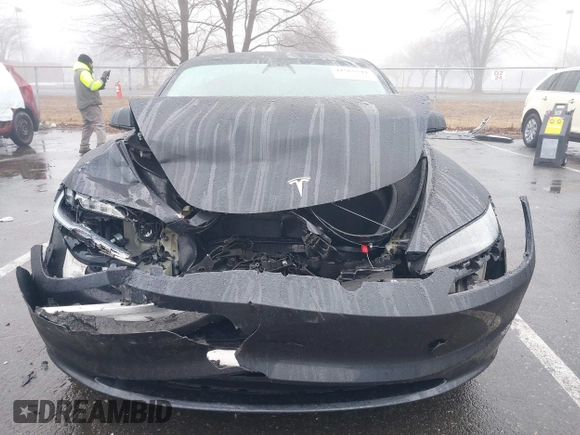 2024 Tesla Model 3 Long Range with VIN 5YJ3E1EB2RF815376, listed as a IAAI auction lot 41565549 with 10,377 mi miles and . Bid and sale history available at DreamBid. Image 6.