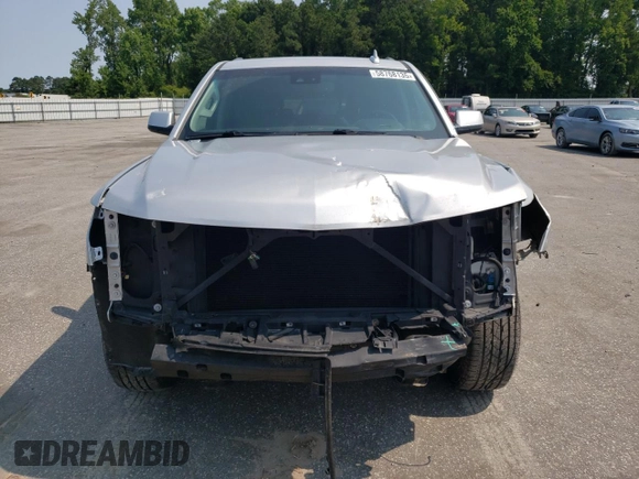2018 Chevrolet Tahoe LT with VIN 1GNSKBKC7JR382344, listed as a Copart auction lot 58768135 with 103,557 mi miles and Salvage title. Bid and sale history available at DreamBid. Image 5.