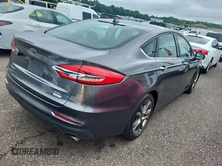 2020 Ford Fusion SEL with VIN 3FA6P0CD7LR197568, listed as a IAAI auction lot 42725343 with 111,304 mi miles and . Bid and sale history available at DreamBid. Image 15.