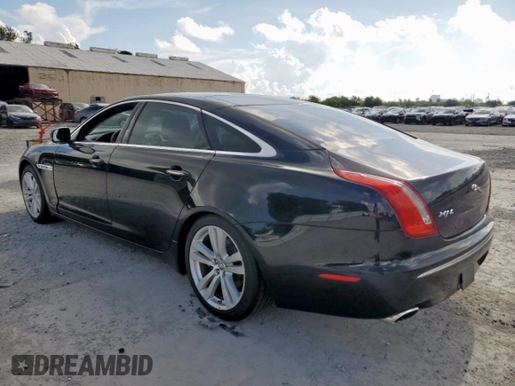 2012 Jaguar XJ XJL with VIN SAJWA2GB7CLV37656, listed as a Copart auction lot 62450905 with 88,954 mi miles and Salvage title. Bid and sale history available at DreamBid. Image 2.