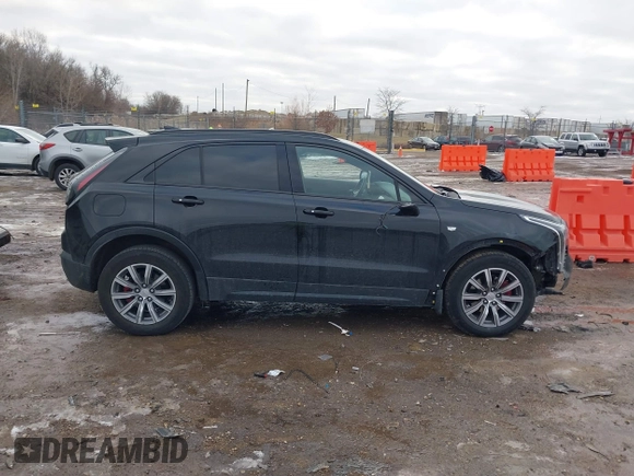 2021 Cadillac XT4 AWD Sport with VIN 1GYFZFR49MF065225, listed as a IAAI auction lot 41191994 with 58,095 mi miles and . Bid and sale history available at DreamBid. Image 13.