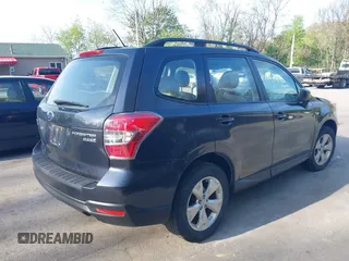 2015 Subaru Forester 2.5i with VIN JF2SJABCXFH599231, listed as a IAAI auction lot 42166220 with 60,409 mi miles and . Bid and sale history available at DreamBid. Image 4.