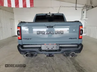 2021 Ram 1500 with VIN 0K1905786880, listed as a Copart auction lot 61756114 with 34,927 mi miles and Clean title. Bid and sale history available at DreamBid. Image 6.