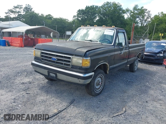 1989 Ford F-150 with VIN 2FTEF14N0KCA90438, listed as a IAAI auction lot 42448592 with 40,038 mi miles and . Bid and sale history available at DreamBid. Image 2.