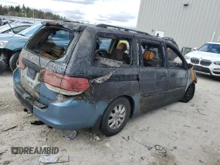 2009 Honda Odyssey EX-L with VIN 5FNRL38699B021100, listed as a Copart auction lot 52871295 with Not Provided miles and Non Repairable. Bid and sale history available at DreamBid. Image 3.