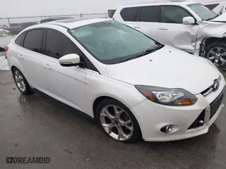 2014 Ford Focus Titanium with VIN 1FADP3J23EL452034, listed as a IAAI auction lot 41180997 with 122,061 mi miles. Bid and sale history available at carsss.com. Image 1.