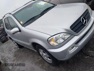 2002 Mercedes-Benz M-Class with VIN 4JGAB54E92A352889, listed as a IAAI auction lot 41805001 with 174,758 mi miles. Bid and sale history available at carsss.com. Image 1.