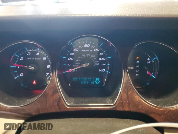 2012 Ford Taurus Limited z VIN 1FAHP2FW3CG142379, wystawiony jako Copart lot #55456245 z przebiegiem 145 311 mil mil oraz Szkoda całkowita • Salvage title. Historia ofert i sprzedaży dostępna na DreamBid. Obrazek 9.