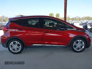 2020 Chevrolet Bolt EV LT z VIN 1G1FY6S01L4136064, wystawiony jako IAAI lot #41566555 z przebiegiem 52 995 mil mil oraz . Historia ofert i sprzedaży dostępna na DreamBid. Obrazek 13.