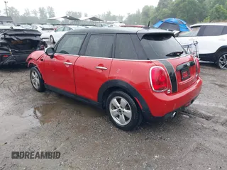 2017 MINI Hardtop 4 Door Cooper with VIN WMWXU1C58H2E18094, listed as a IAAI auction lot 42312473 with 50,482 mi miles and . Bid and sale history available at DreamBid. Image 3.