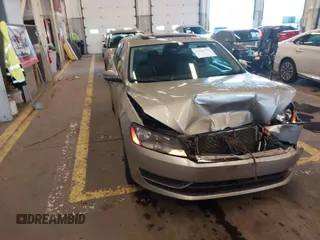2014 Volkswagen Passat SE z VIN 1VWBN7A36EC064753, wystawiony jako IAAI lot #41221736 z przebiegiem 106 105 mil mil oraz . Historia ofert i sprzedaży dostępna na DreamBid. Obrazek 1.