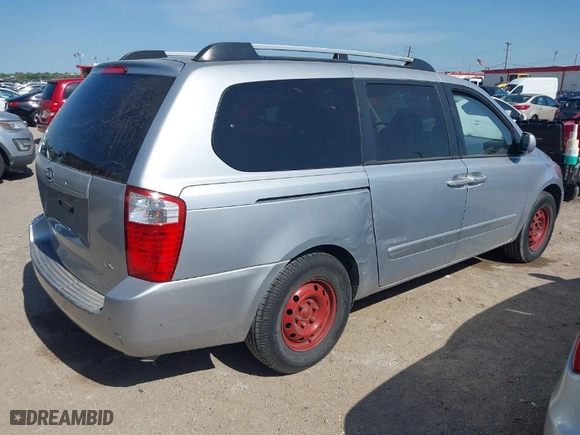 2006 Kia Sedona LX with VIN KNDMB233266036243, listed as a IAAI auction lot 41929441 with 202,851 mi miles. Bid and sale history available at carsss.com. Image 4.