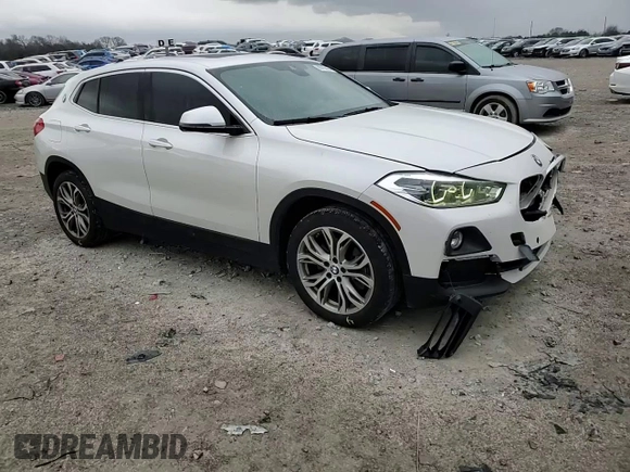 2019 BMW X2 sDrive28i with VIN WBXYJ3C58K5N39693, listed as a Copart auction lot 86760414 with 77,668 mi miles and Salvage Title. Bid and sale history available at carsss.com. Image 11.