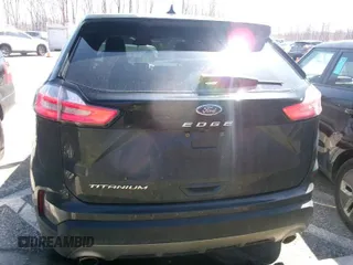 2021 Ford Edge Titanium z VIN 2FMPK3K95MBA51483, wystawiony jako IAAI lot #41989713 z przebiegiem 112 224 mil mil oraz . Historia ofert i sprzedaży dostępna na DreamBid. Obrazek 1.