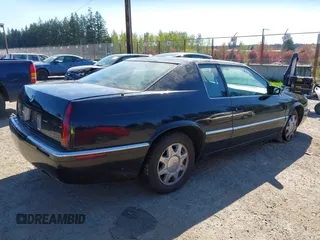 1998 Cadillac Eldorado Touring with VIN 1G6ET1295WU610253, listed as a IAAI auction lot 42066181 with 85,172 mi miles and . Bid and sale history available at DreamBid. Image 4.