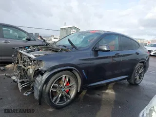 2021 BMW X4 M40i with VIN 5UX2V5C0XM9E16773, listed as a IAAI auction lot 41230634 with 52,779 mi miles. Bid and sale history available at carsss.com. Image 15.