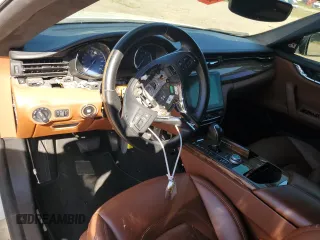 2017 Maserati Quattroporte z VIN ZAM56RRL1H1230279, wystawiony jako Copart lot #67067924 z przebiegiem Nie podano mil oraz Czysty tytuł • Clean title. Historia ofert i sprzedaży dostępna na DreamBid. Obrazek 8.