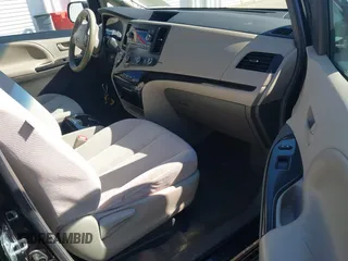 2012 Toyota Sienna LE AAS with VIN 5TDKK3DC3CS263240, listed as a IAAI auction lot 41810686 with 232,026 mi miles. Bid and sale history available at carsss.com. Image 5.