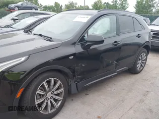 2019 Cadillac XT4 AWD Sport z VIN 1GYFZFR48KF197731, wystawiony jako IAAI lot #42668639 z przebiegiem 73 170 mil mil oraz . Historia ofert i sprzedaży dostępna na DreamBid. Obrazek 6.