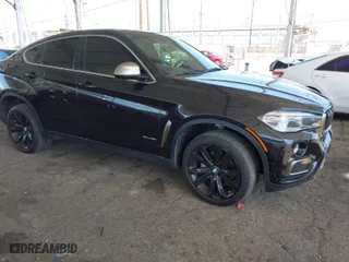 2017 BMW X6 xDrive35i with VIN 5UXKU2C56H0N85080, listed as a IAAI auction lot 41955473 with 142,201 mi miles. Bid and sale history available at carsss.com. Image 1.