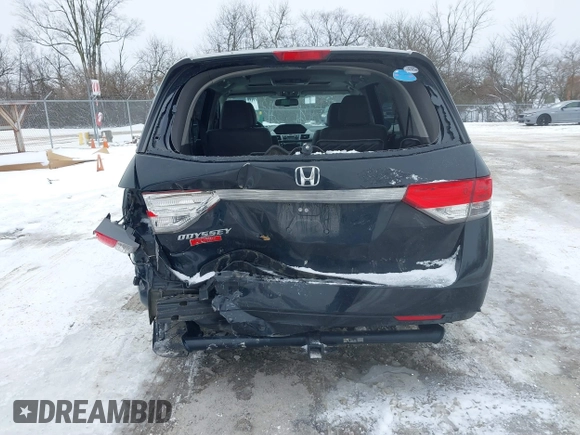 2015 Honda Odyssey EX-L with VIN 5FNRL5H60FB018030, listed as a IAAI auction lot 41608357 with 166,214 mi miles and . Bid and sale history available at carsss.com. Image 6.