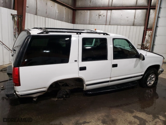 1999 Chevrolet Tahoe Z71 with VIN 1GNEK13R4XJ356365, listed as a Copart auction lot 49849285 with 187,701 mi miles and Salvage Title. Bid and sale history available at carsss.com. Image 3.