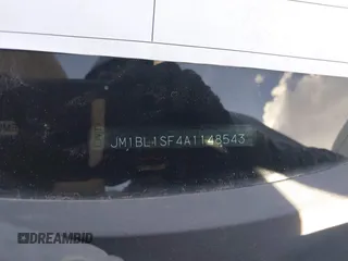 2010 Mazda 3 i SV with VIN JM1BL1SF4A1148543, listed as a IAAI auction lot 40110323 with 131,801 mi miles and . Bid and sale history available at DreamBid. Image 9.