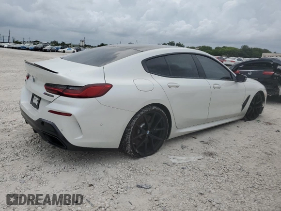 2020 BMW 8 Series M850i with VIN WBAGV8C00LCD38284, listed as a Copart auction lot 60605075 with 57,161 mi miles and Salvage title. Bid and sale history available at DreamBid. Image 3.