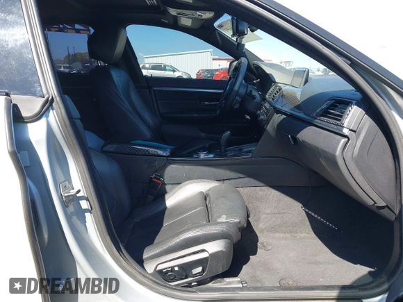 2015 BMW 4 Series 428i xDrive with VIN WBA4C9C54FD330582, listed as a IAAI auction lot 42135691 with 127,289 mi miles and . Bid and sale history available at DreamBid. Image 5.