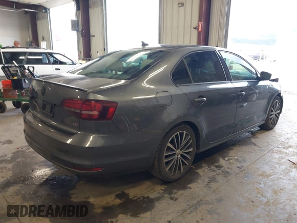 2016 Volkswagen Jetta Sport z VIN 3VWD17AJ8GM410208, wystawiony jako IAAI lot #42237019 z przebiegiem 67 137 mil mil oraz . Historia ofert i sprzedaży dostępna na DreamBid. Obrazek 4.