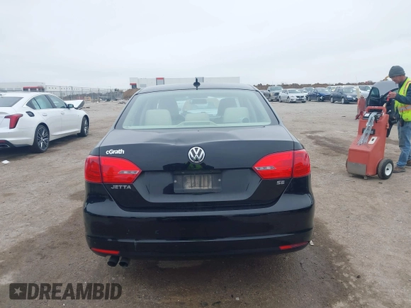 2014 Volkswagen Jetta Sedan SE w/Connectivity with VIN 3VWD07AJ4EM370905, listed as a IAAI auction lot 41472856 with 146,662 mi miles. Bid and sale history available at carsss.com. Image 16.