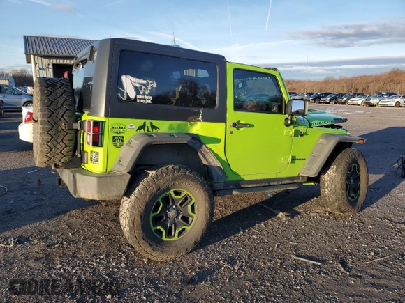 2013 Jeep Wrangler Rubicon 10th Anniversary with VIN 1C4BJWCG0DL506174, listed as a Copart auction lot 85300514 with 133,974 mi miles and Salvage Title. Bid and sale history available at DreamBid. Image 3.