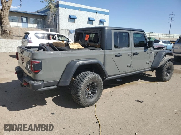 2020 Jeep Gladiator Rubicon with VIN 1C6JJTBG9LL163270, listed as a Copart auction lot 53654005 with 74,744 mi miles and Salvage title. Bid and sale history available at DreamBid. Image 3.