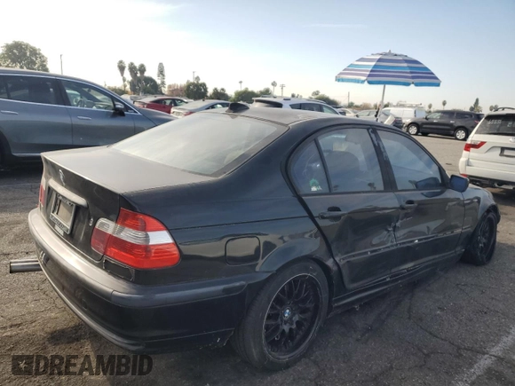 2002 BMW 3 Series 330i with VIN WBAEV53452KM00658, listed as a Copart auction lot 82062874 with 106,031 mi miles and Salvage Title. Bid and sale history available at carsss.com. Image 3.