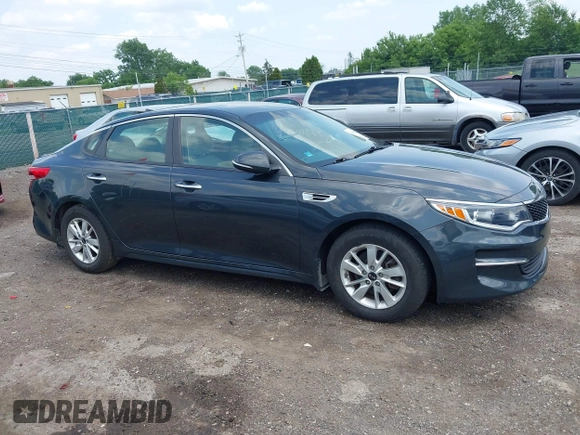 2016 Kia Optima LX z VIN 5XXGT4L37GG087200, wystawiony jako IAAI lot #42456982 z przebiegiem 86 910 mil mil oraz . Historia ofert i sprzedaży dostępna na DreamBid. Obrazek 13.