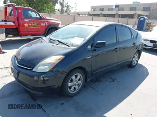 2007 Toyota Prius z VIN JTDKB20U977643711, wystawiony jako IAAI lot #42411905 z przebiegiem 112 362 mil mil oraz . Historia ofert i sprzedaży dostępna na DreamBid. Obrazek 2.