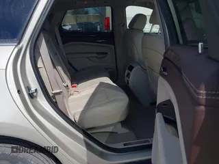 2015 Cadillac SRX Luxury Collection with VIN 3GYFNEE32FS638242, listed as a IAAI auction lot 41866683 with 32,277 mi miles. Bid and sale history available at carsss.com. Image 8.