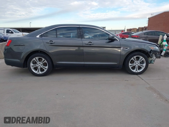 2017 Ford Taurus SEL z VIN 1FAHP2E80HG129843, wystawiony jako IAAI lot #41252910 z przebiegiem 111 923 mil mil oraz . Historia ofert i sprzedaży dostępna na DreamBid. Obrazek 13.
