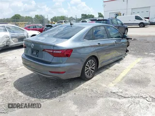 2021 Volkswagen Jetta S z VIN 3VWC57BU4MM009727, wystawiony jako IAAI lot #42339309 z przebiegiem 52 395 mil mil oraz . Historia ofert i sprzedaży dostępna na DreamBid. Obrazek 4.