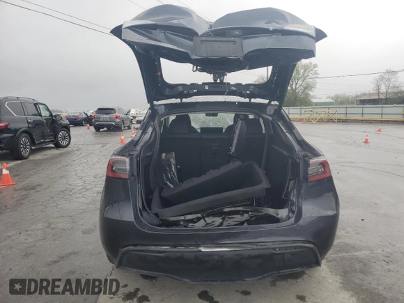 2024 Tesla Model Y with VIN 7SAYGDED1RA321691, listed as a Copart auction lot 52153945 with 7,544 mi miles and Salvage Title. Bid and sale history available at DreamBid. Image 6.